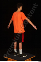  Danior black shorts black sneakers dressed orange t shirt shoes sports standing whole body 0014.jpg
